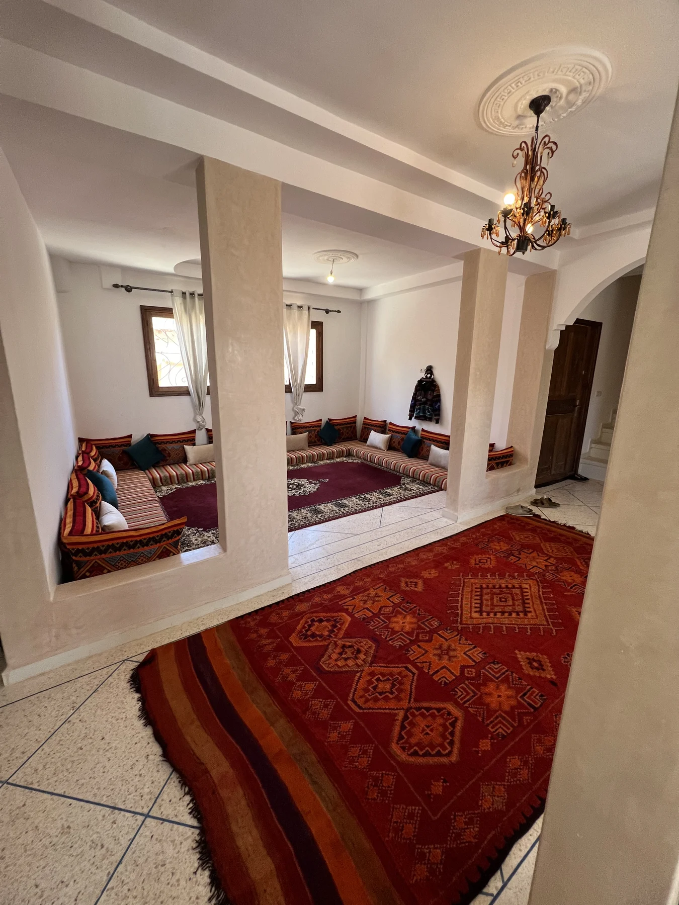 Salon pillars and red carpet